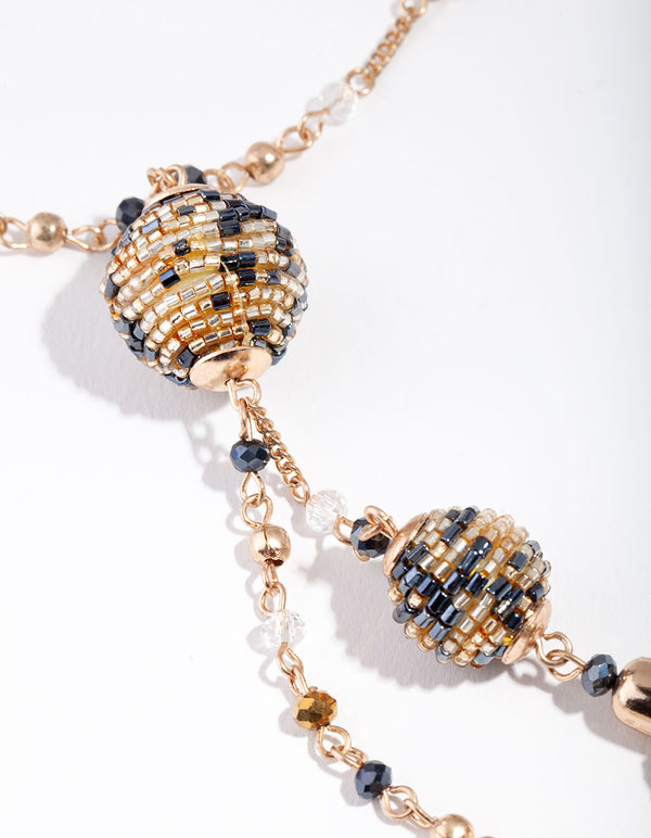 Gold Bugle Bead Tassel Necklace