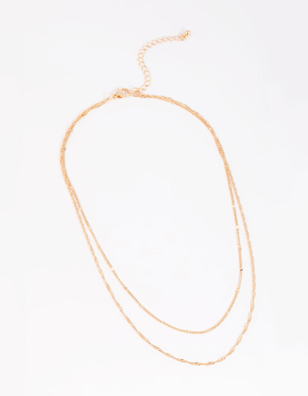 Featuring a gold twisted layered necklace front view