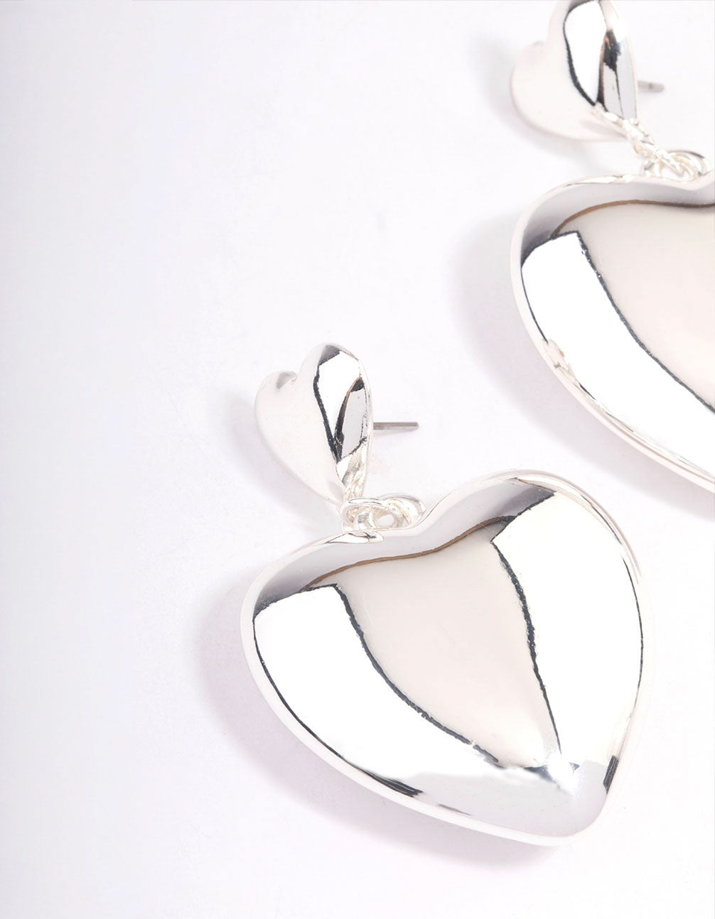 Silver Puffy Heart Statement Earrings