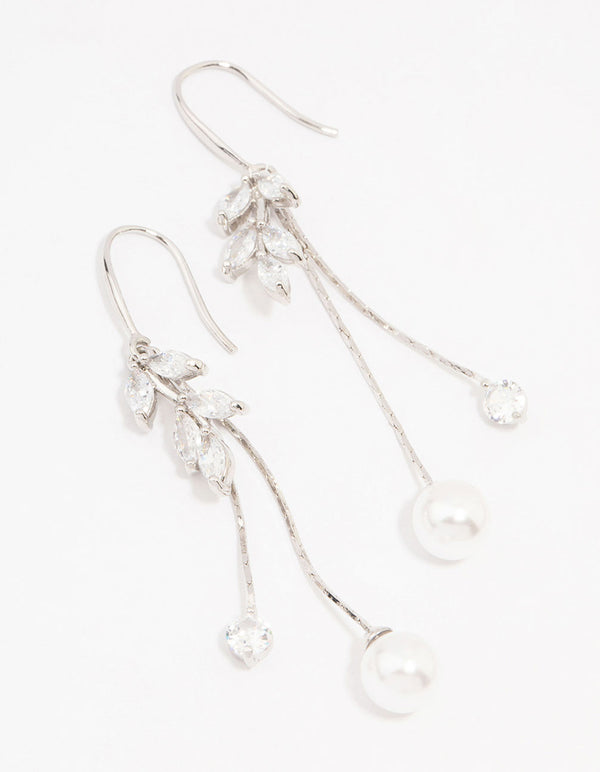 Showcasing silver cubic zirconia leaf and pearl drop earrings front view
