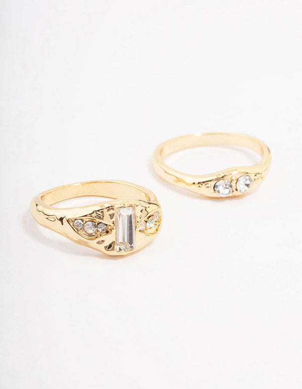 Showcasing gold plated baguette signet stacking ring pack with cubic zirconia front view