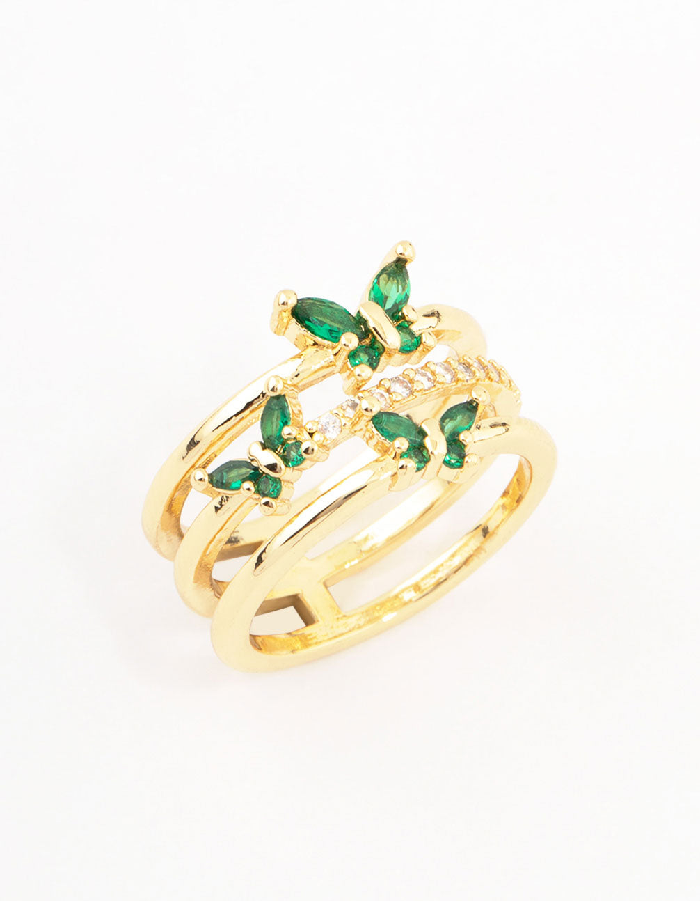 Elegant triple butterfly band ring in plated material featuring emerald cut stones with green and clear accents close up view