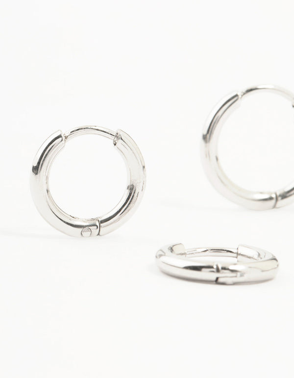 Featuring surgical steel classic hoop earrings in a 2-pack with silver finish close up view