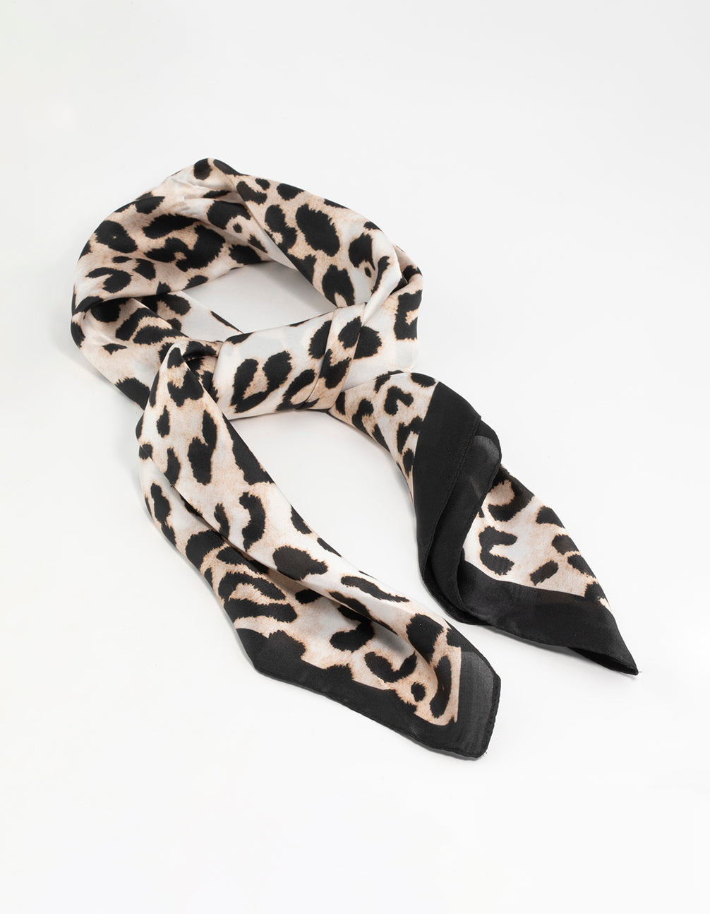 Stylish leopard print satin scarf crafted from fabric in black beige tan and white front view
