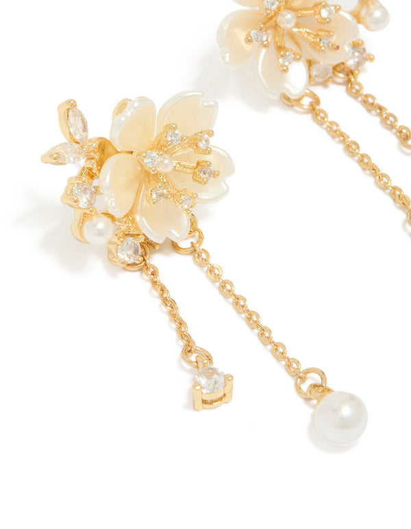 Elegant gold plated acrylic flower pearl drop earrings with statement styling close up view