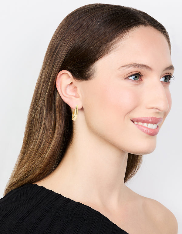 Gold Oval Huggie Earrings