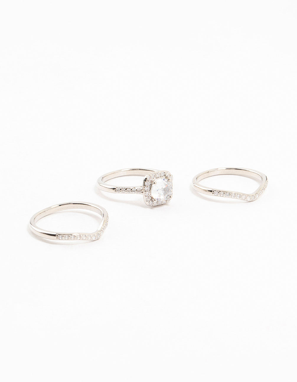 Showcasing a silver pointed and halo ring pack featuring cubic zirconia with halo cut stones front view