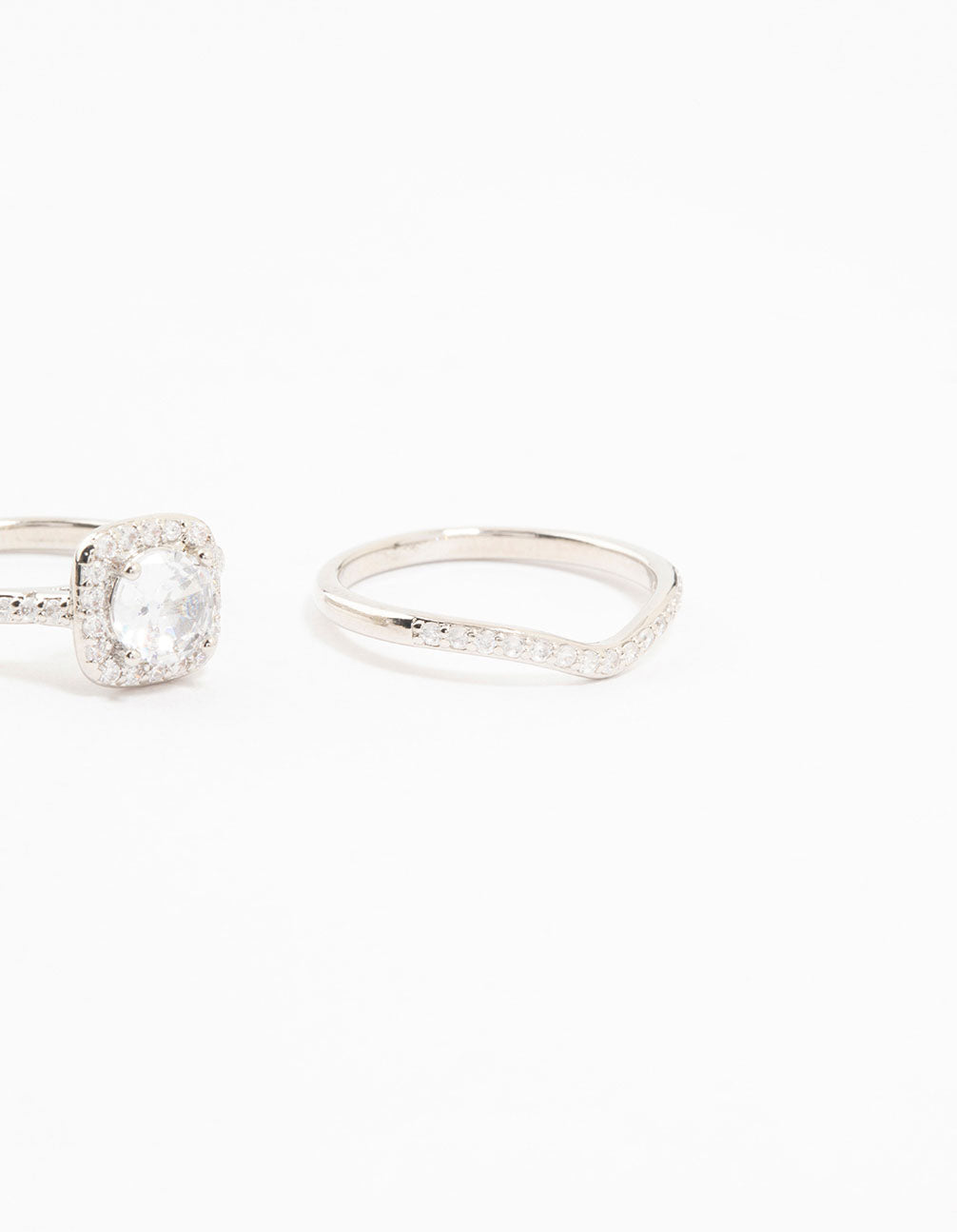 Elegant silver pointed and halo ring pack designed with cubic zirconia stones in halo cut side detail view