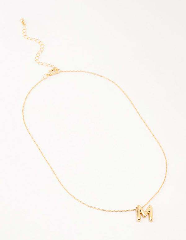 Showcasing a bubble letter M necklace with initials in gold plated finish front view
