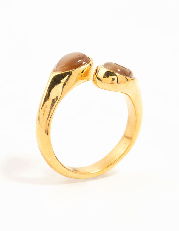 Crafted from waterproof gold plated stainless steel with double pear cut stones side detail view