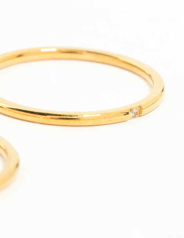 Featuring waterproof gold plated stainless steel construction, these fine band rings come in a 2-pack side detail view