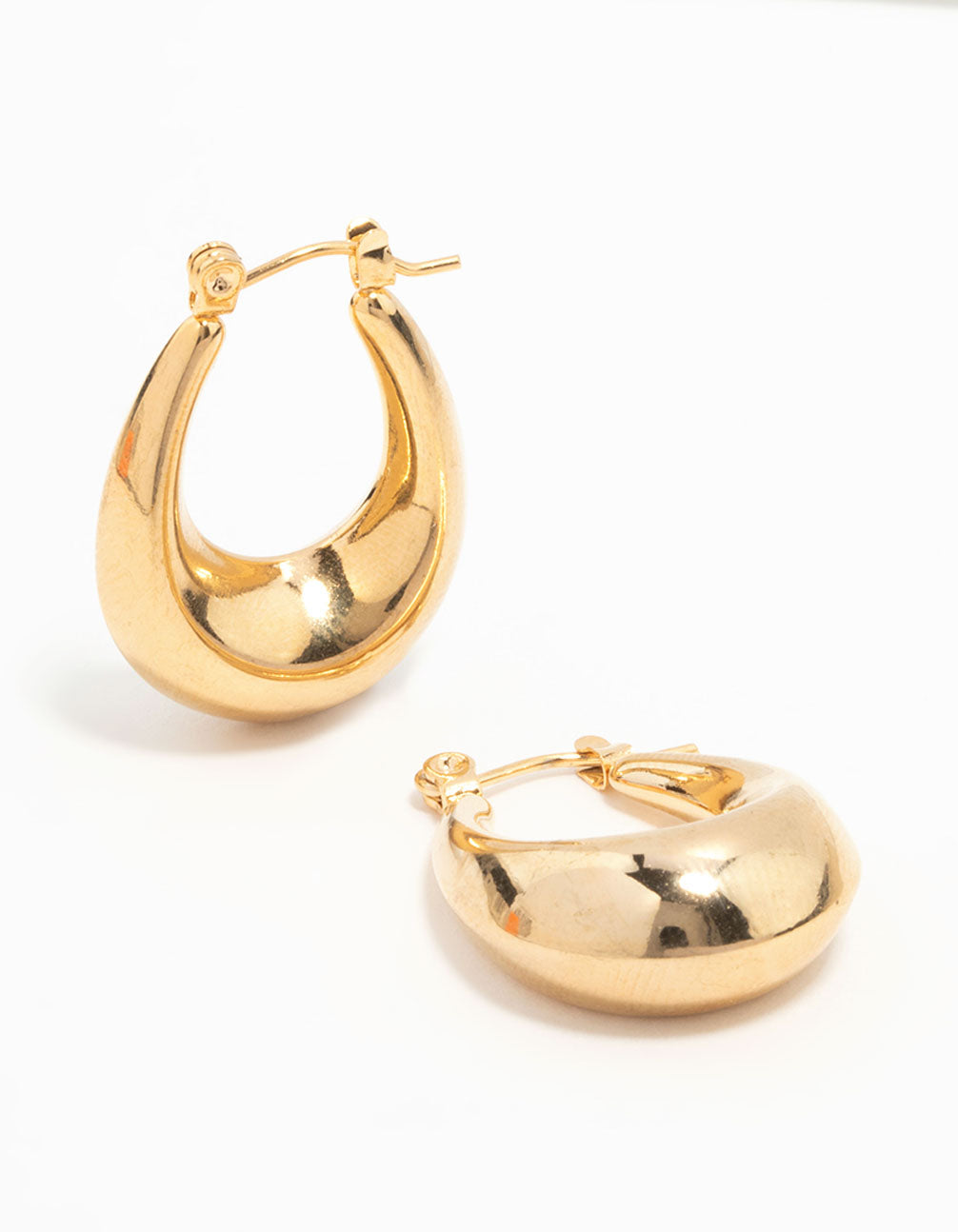 Featuring waterproof gold plated stainless steel mini full loop hoop earrings in gold front view