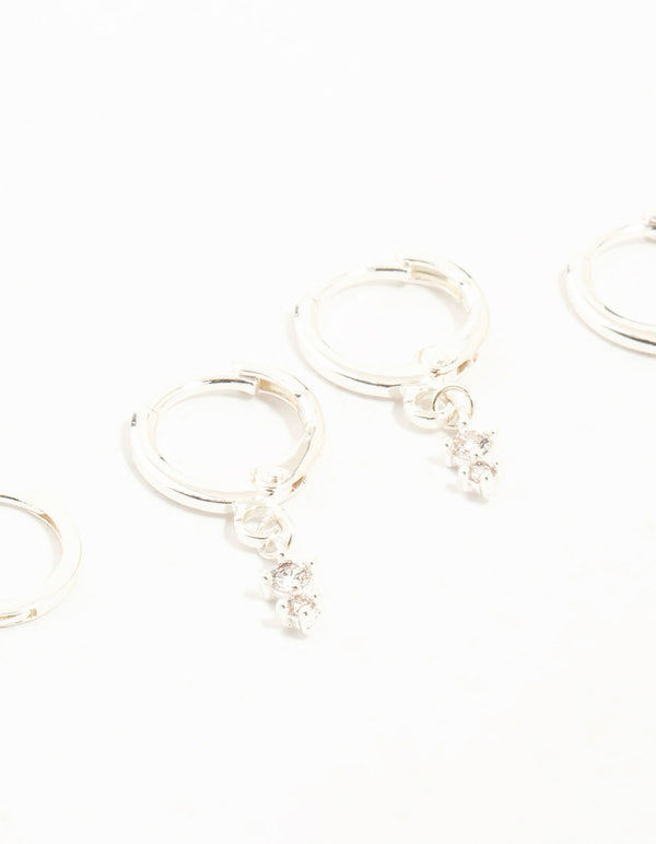 Featuring dainty charm hoop earrings with cubic zirconia in a 3-pack close up view