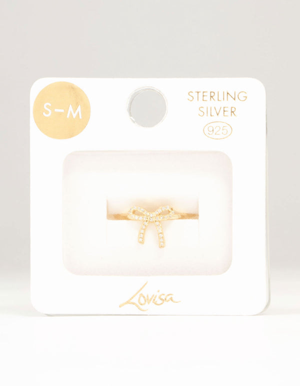 Elegantly designed cubic zirconia in gold plated sterling silver ring featuring bow detail close up view
