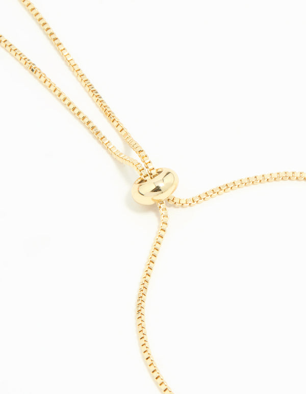 Expertly crafted gold plated pearl flower toggle bracelet with beads, charm details, and white tones closure detail view