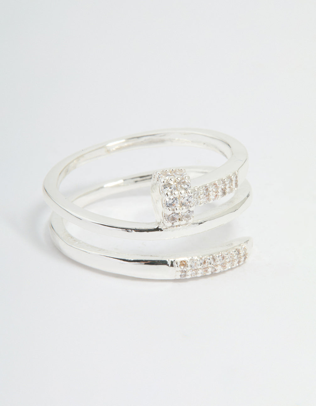 Showcasing a statement nail wrap ring crafted from silver plated metal, featuring cubic zirconia stones front view