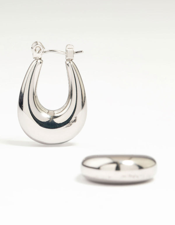 Showcasing waterproof stainless steel half hoop earrings with hoop closure in silver finish front view