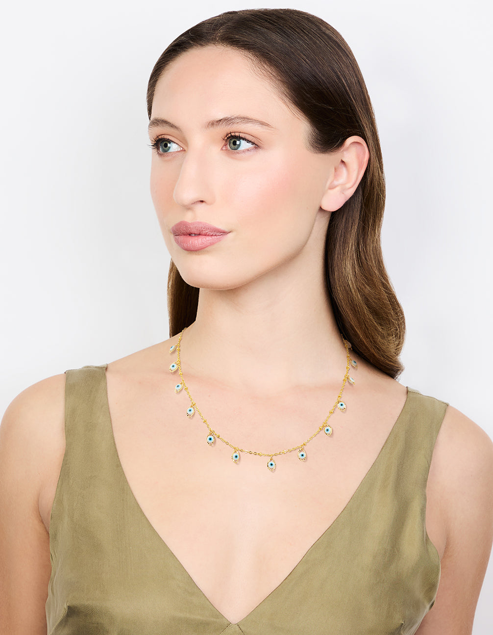 Designed with waterproof gold plated stainless steel is this evil eye charm pendants necklace on model view