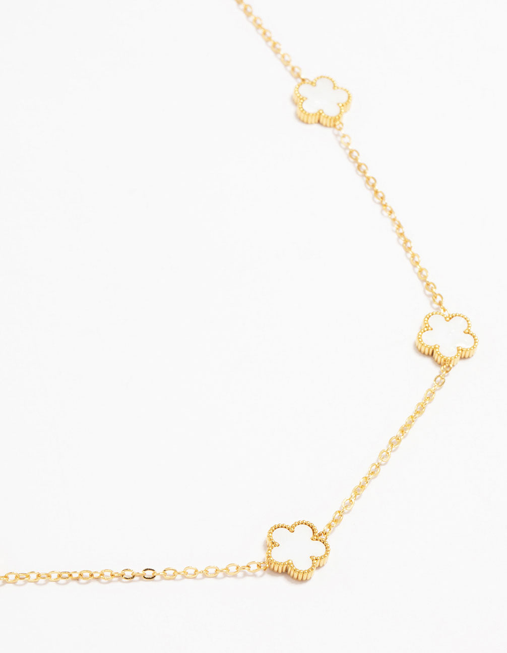 Showcasing a waterproof gold plated stainless steel shell petal flower pendant necklace featuring floral in dainty style close up view