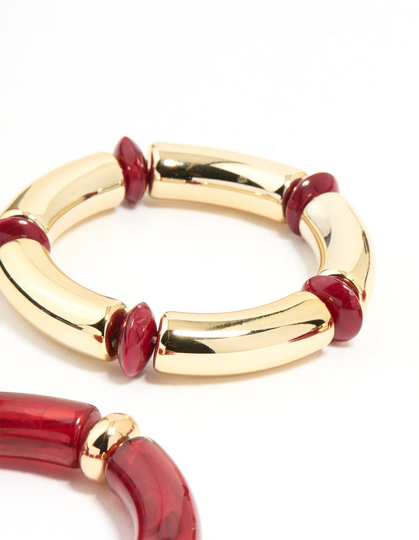 Crafted with beaded stretch bangles in a 3-pack featuring maroon accents and gold finish detail view