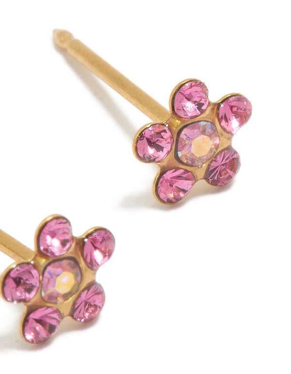 Elegantly designed floral stud earrings with 24K gold plated surgical stainless steel and pink cubic zirconia in daisy pattern post detail view