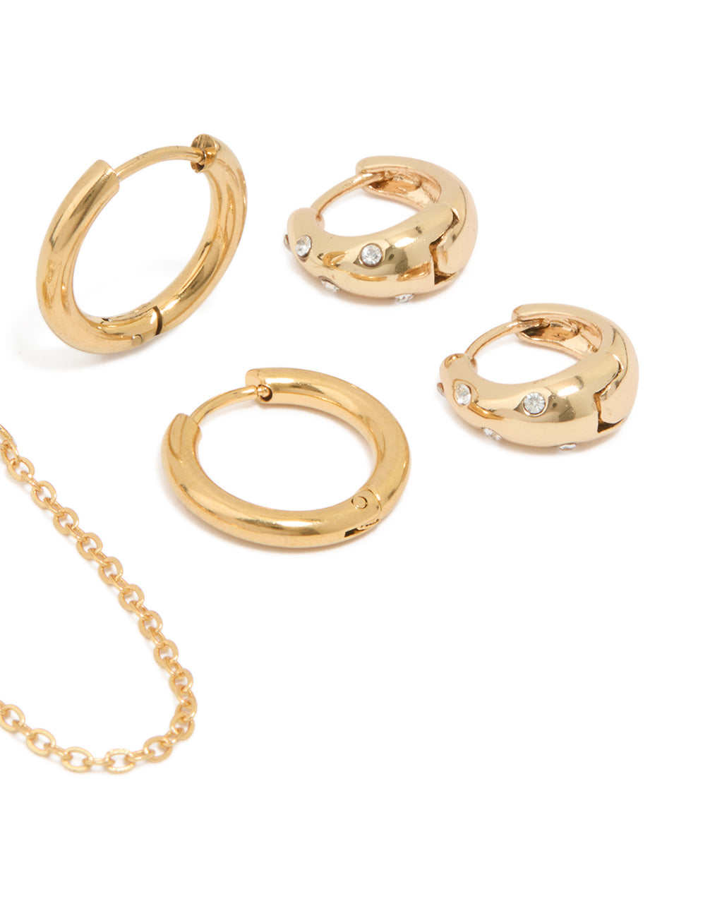 Crafted from waterproof gold plated stainless steel cubic zirconia and sleek huggie earrings in a statement 3-pack post detail view