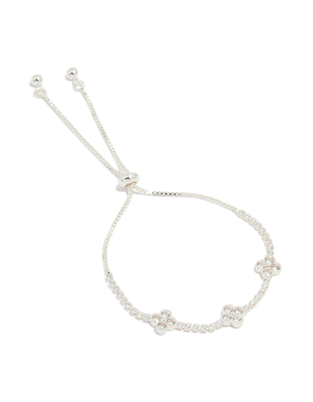 Showcasing a silver plated cubic zirconia flower station toggle bracelet in dainty style front view