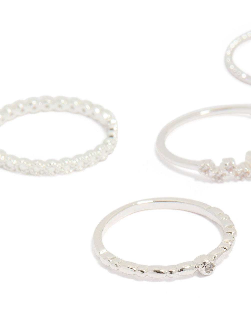 Crafted from silver plated material, squiggle rings 5-pack close up view