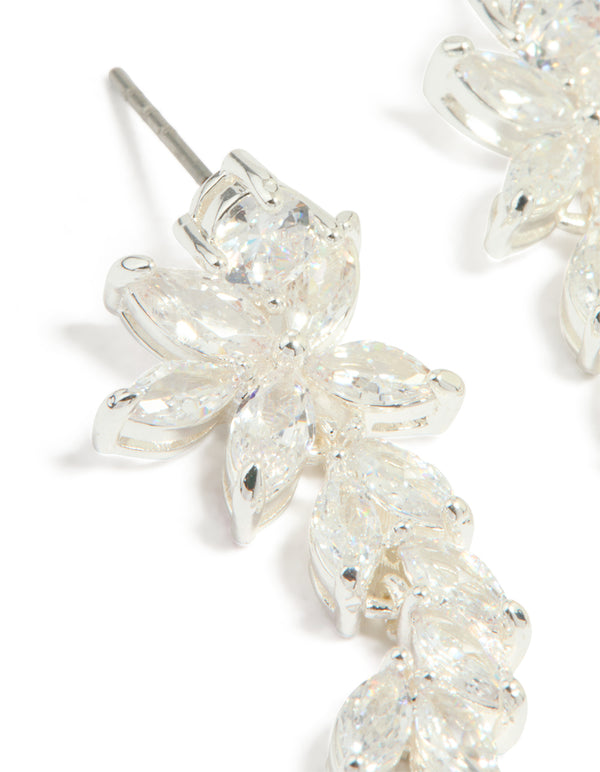 Detailed view of silver plated cubic zirconia medium flower vine drop earrings highlighting leaf elements close up view
