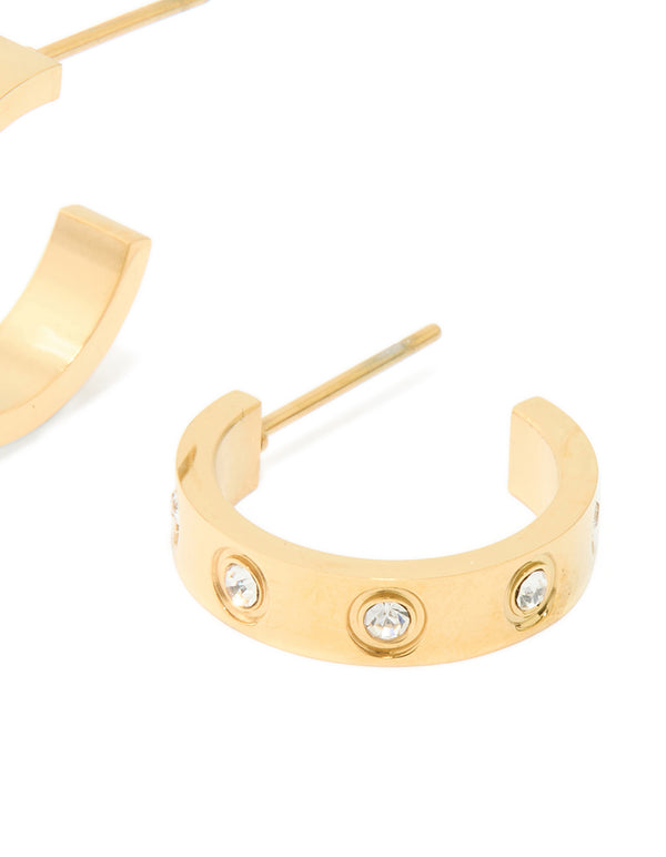 Featuring waterproof gold plated stainless steel cubic zirconia square hoop earrings with detailed post construction post detail view