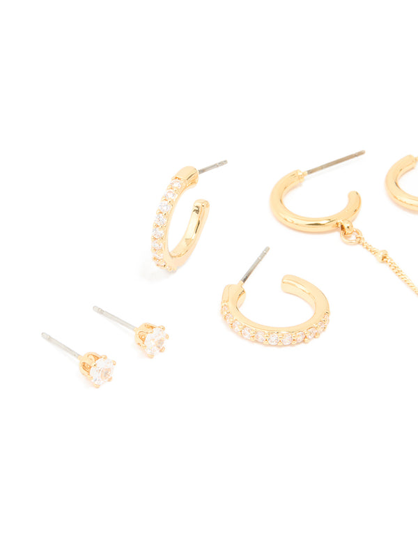 Showcasing gold plated brass hoop earrings with cubic zirconia stones and chain accents in a 3-pack close up view
