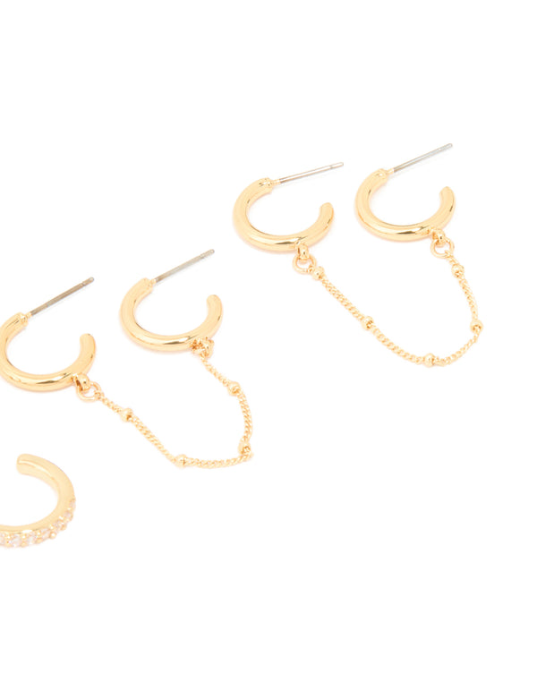 Designed with gold plated brass hoops featuring cubic zirconia and delicate chain accents in a 3-pack set post detail view