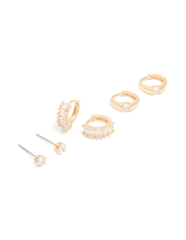 Showcasing gold cubic zirconia hoop and stud earrings in a 3-pack with huggie closure front view