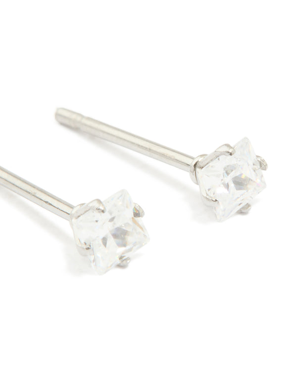Elegant waterproof stainless steel prism cubic zirconia stud earrings in silver and clear post detail view