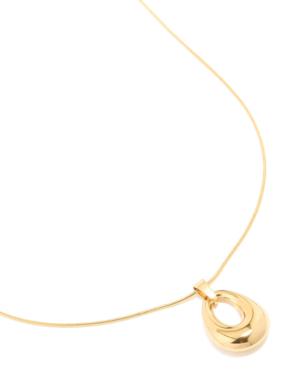 Featuring a waterproof open oval pendant necklace crafted from gold plated stainless steel close up view