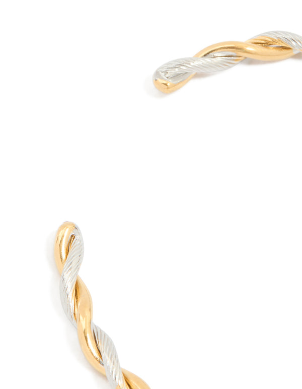 Elegant waterproof twist detail open wrist cuff crafted from gold plated stainless steel in silver tones closure detail view