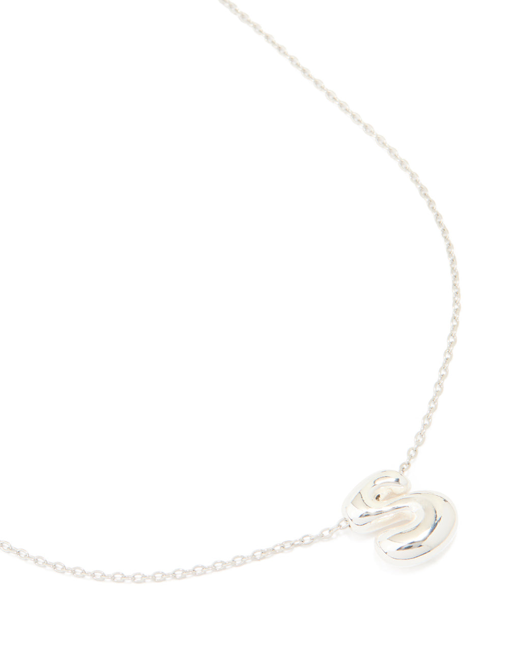 Showcasing a waterproof stainless steel large bubble letter S pendant initial necklace in silver close up view