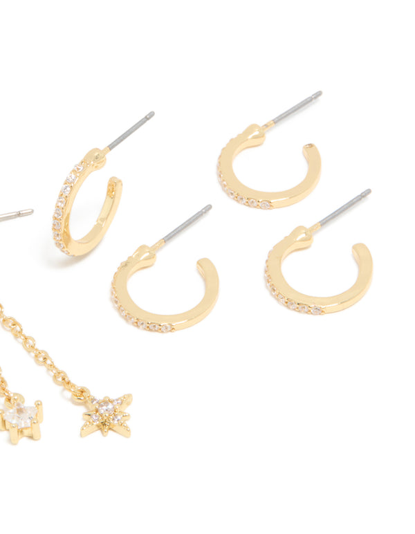Crafted in gold plated cubic zirconia celestial chain and fine hoop earrings 4-pack with charm accents featuring star details and huggie closure styling post detail view