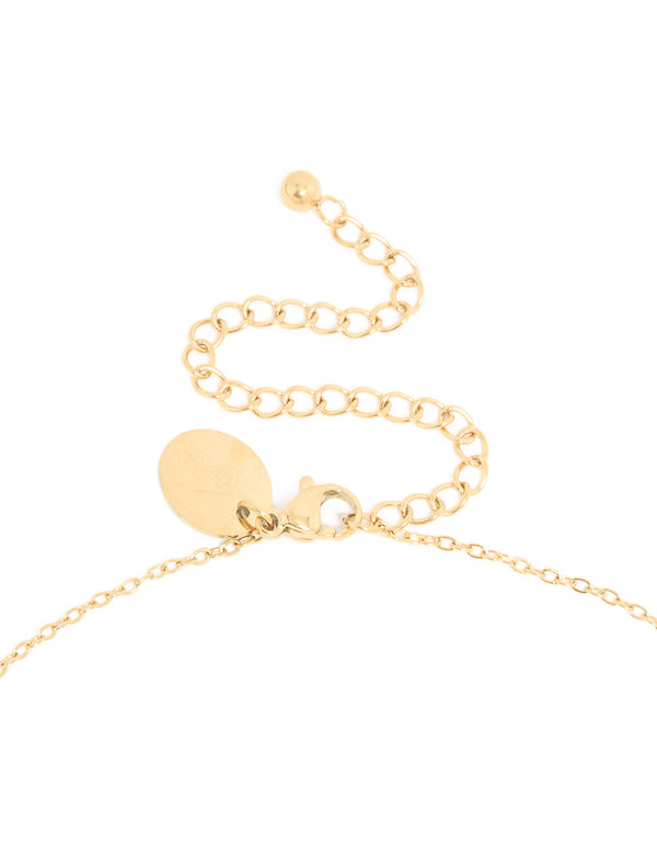 Featuring a waterproof December birth flower poinsettia necklace with floral detail in gold plated stainless steel clasp detail view