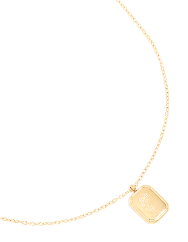 Showcasing a waterproof gold plated stainless steel flower April daisy pendant necklace close up view
