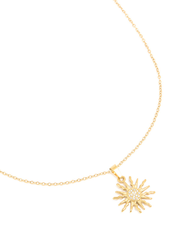 Discover this celestial statement necklace crafted from waterproof stainless steel with sunburst pendant in gold plated finish close up view