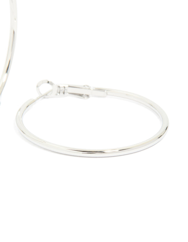 Highlighting waterproof stainless steel hoop earrings in silver post detail view