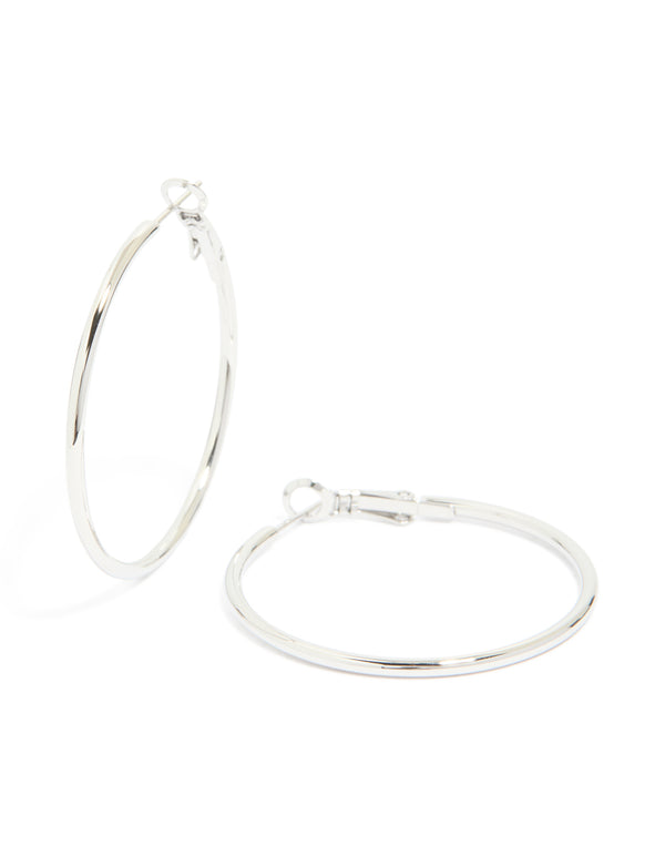 Showcasing waterproof stainless steel hoop earrings crafted from silver front view