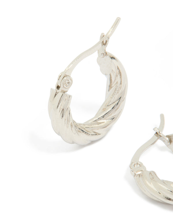 Crafted from waterproof stainless steel twisted hoop earrings in silver post detail view