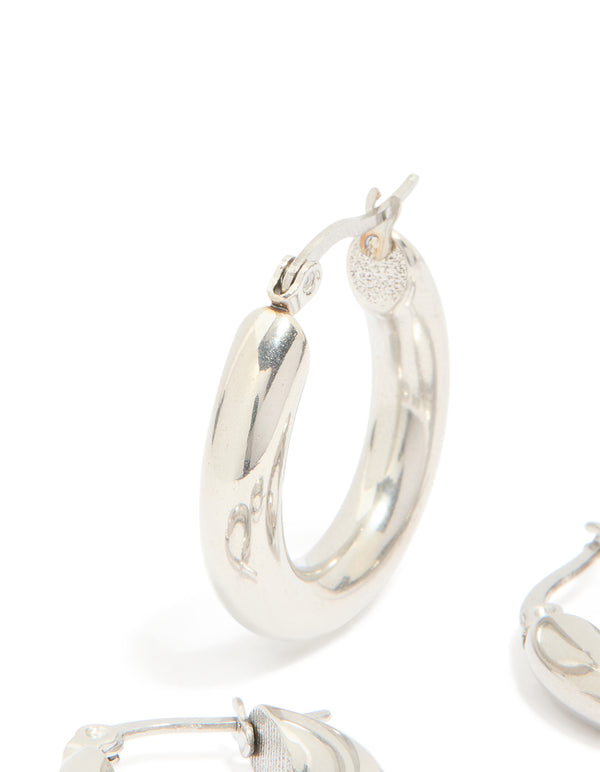 Crafted from waterproof stainless steel, these tube hoop earrings in a 2-pack with silver hoop closure close up view