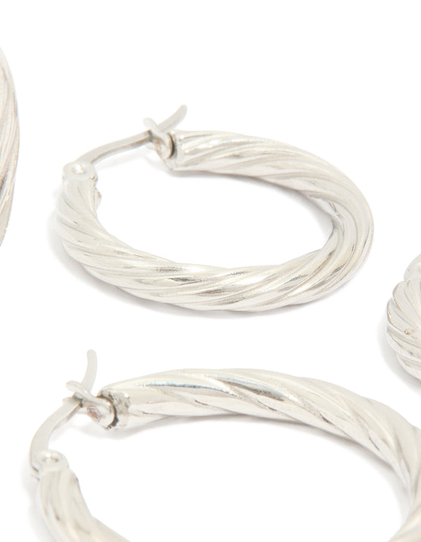 Crafted from waterproof stainless steel twisted hoop earrings in a 3-pack with silver finish post detail view
