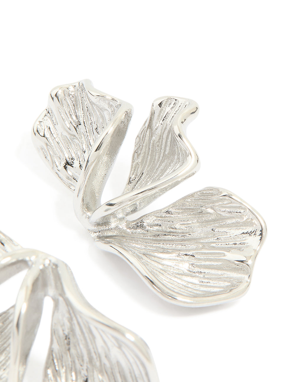 Detailed view of flower petal fan waterproof stainless steel earrings in silver post detail view
