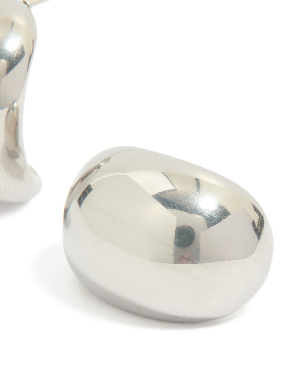 Highlighting waterproof stainless steel small cave stud earrings in silver post detail view