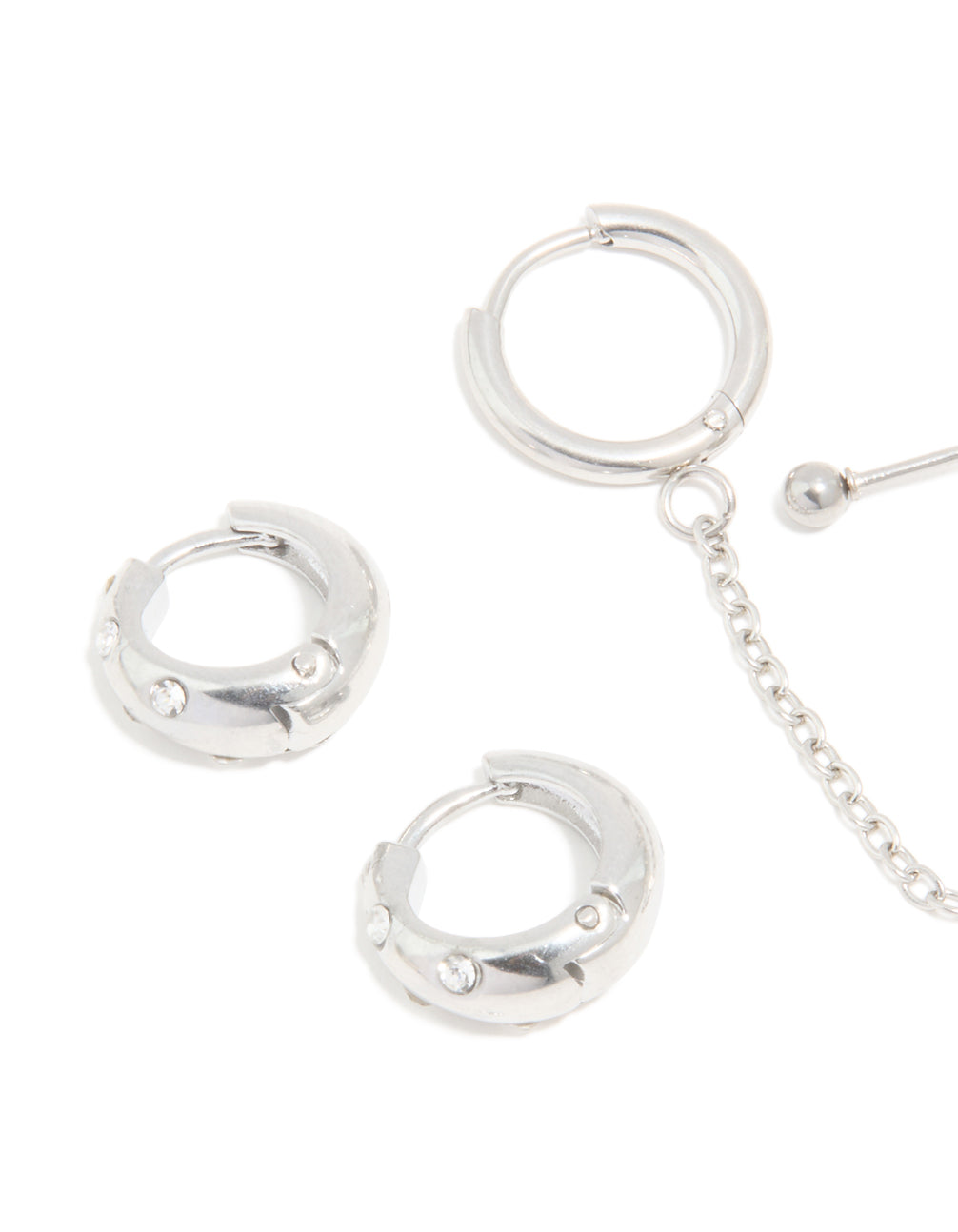 Showing waterproof stainless steel chain and huggie earrings in a 3-pack with stud closure in silver finish close up view