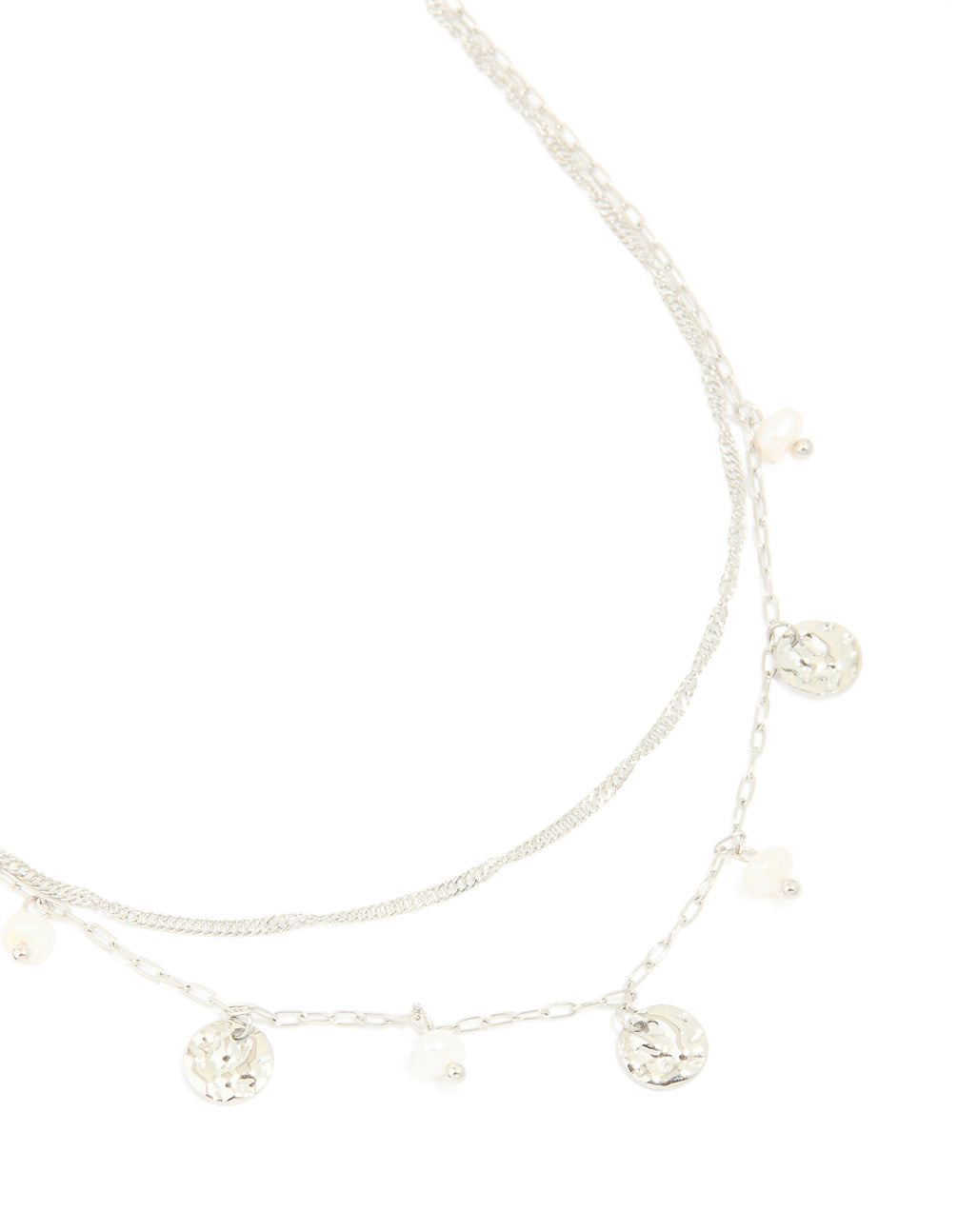 Showcasing a waterproof stainless steel layered necklace featuring charm & molting pendants with ivory pearls close up view